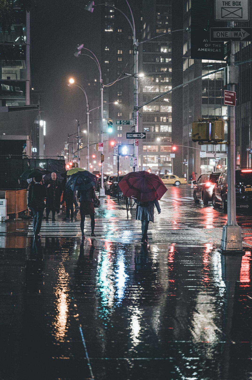 rainy city street at night